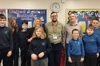 Freddie with staff and pupils at Chilworth House School