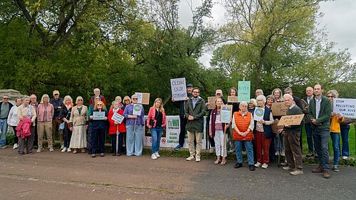 Freddie at the WI Clean River protest with fellow campaigners