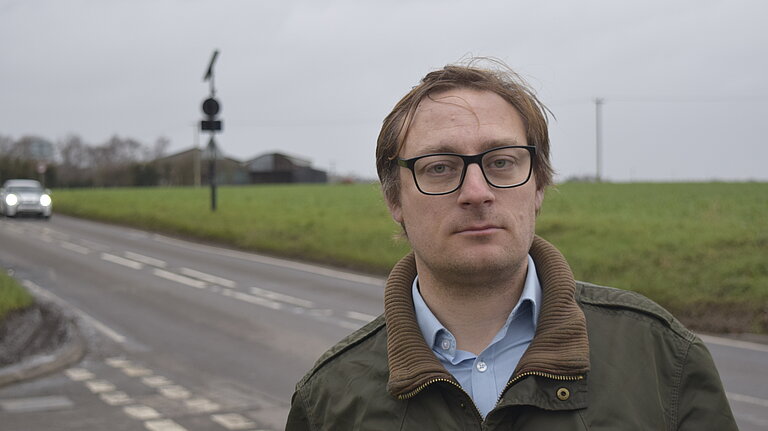 Olly by the A417 road