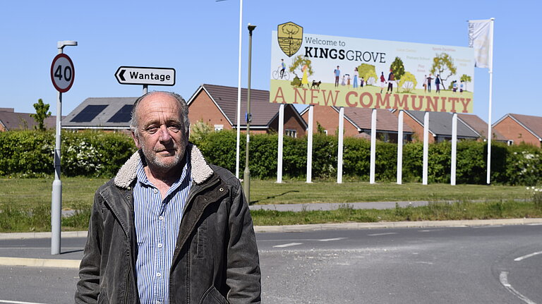 Andy Crawford by the Grove Sign