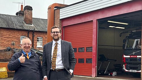 Freddie and Councillor Leigh Rawlins outside Henley Fire Station