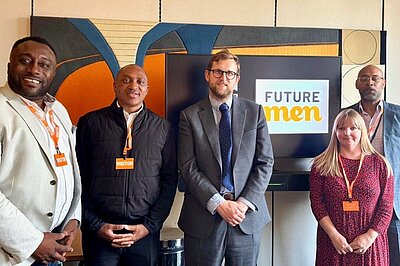 Freddie standing with colleagues at the Fatherhood APPG