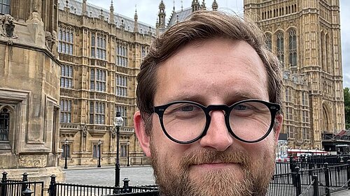Freddie standing outside Westminster